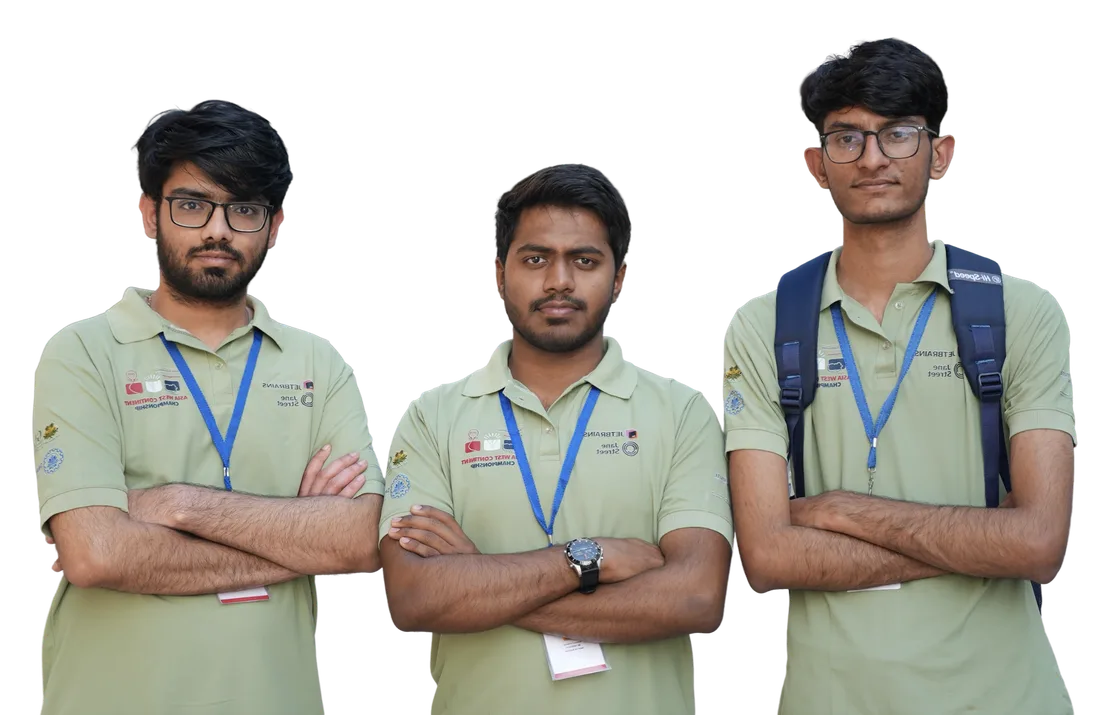 Three first-year NST students in ICPC Asia West polos